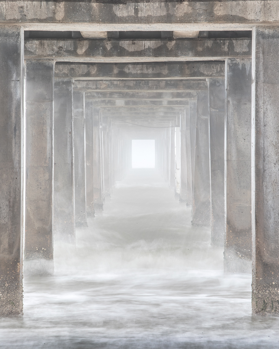Under Horace Caldwell Pier in fog - Port Aransas