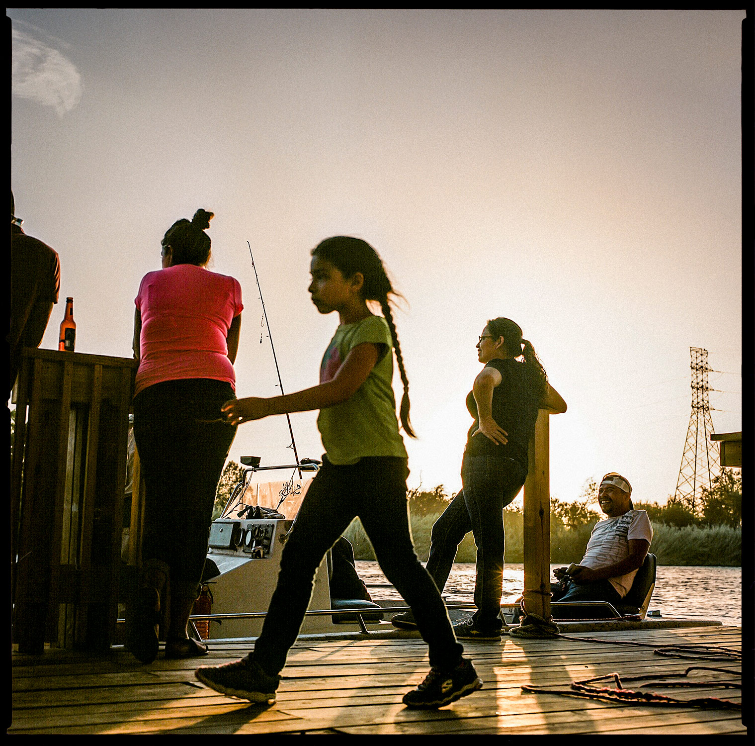 Family on boat dock -  Rio Grande River in Texas