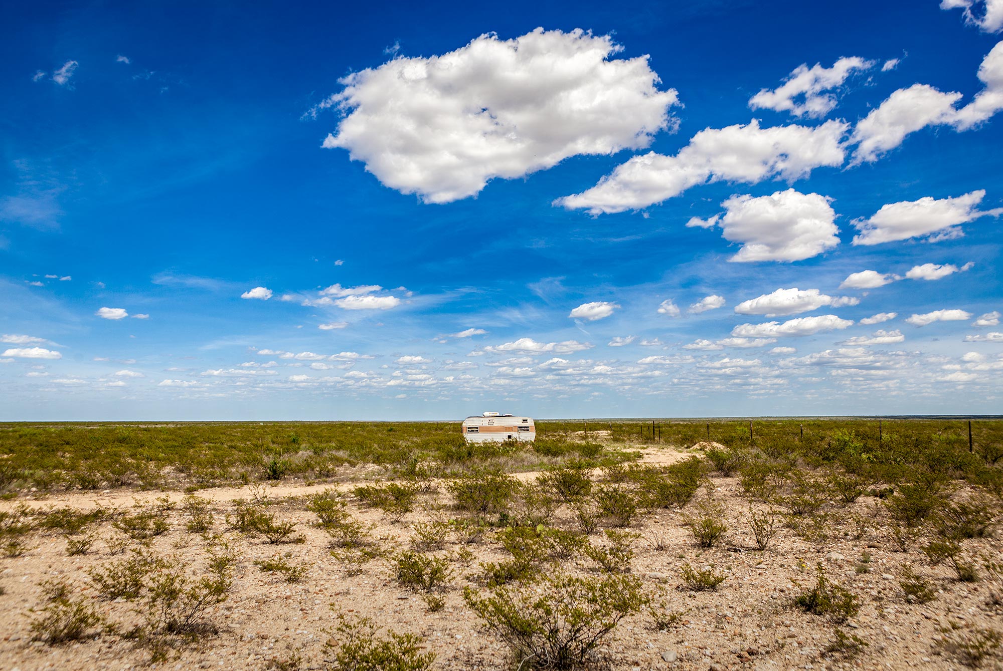 Old travel trailer in the desert West Texas